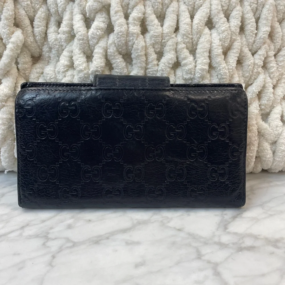 Gucci Black Embossed GG Leather Wallet with Gold Nameplate